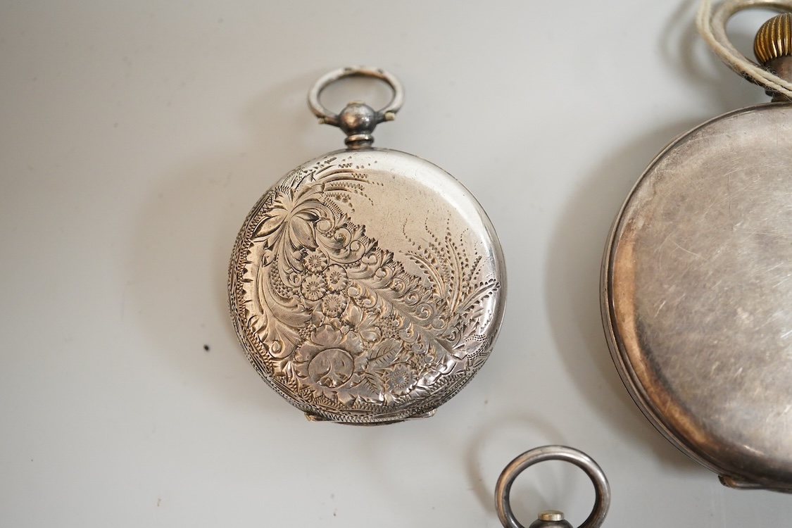 An early 20th century silver open faced pocket watch, with Arabic dial and subsidiary seconds, together with four other white metal open faced fob watches and a white metal half hunter pocket watch, case diameter 44mm.